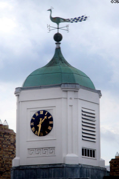 Cupola clock tower with peacock weather vane atop Chester Beatty Museum at Dublin Castle. Dublin, Ireland.