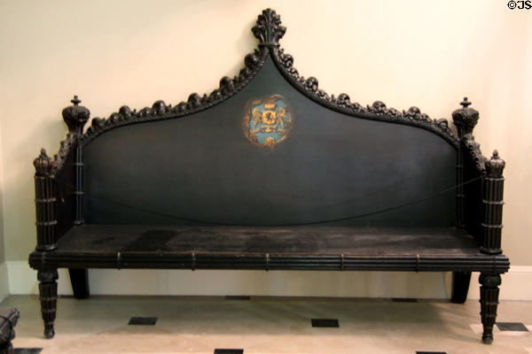 Bench with coat of arms in entrance hall of State Apartments at Dublin Castle. Dublin, Ireland.