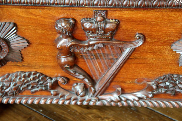 Irish harp carving on Cellarette in dining room at Dublin Castle. Dublin, Ireland.