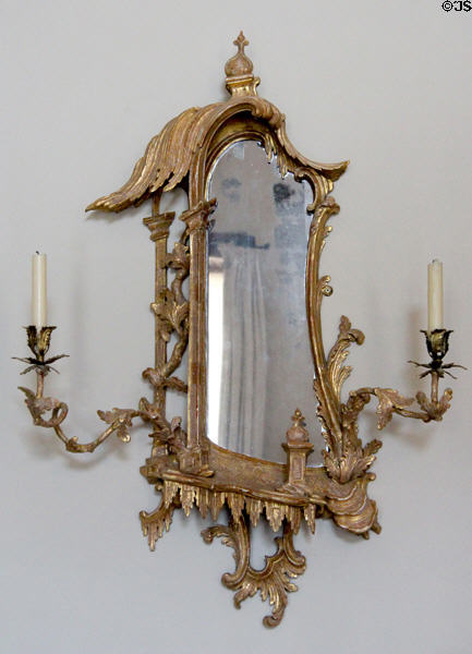 Mirror with candle sconces in entrance hall at Russborough House. Ireland.