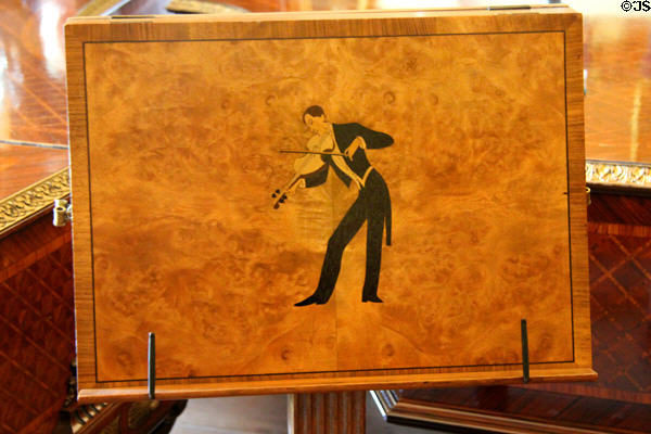 Art deco music stand with inlaid pianist by Robert Lutyens in music room at Russborough House. Ireland.