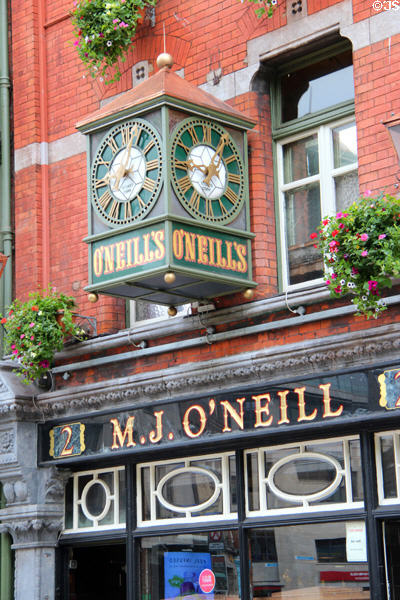 M.J. O'Neill pub street clock (Suffolk St.). Dublin, Ireland.