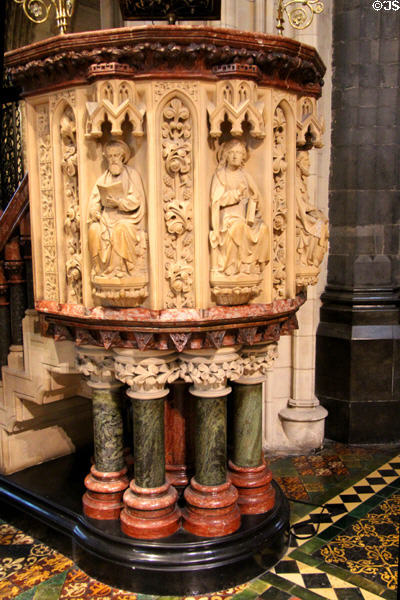 Pulpit with carvings of Evangelists at Christ Church Cathedral. Dublin, Ireland.