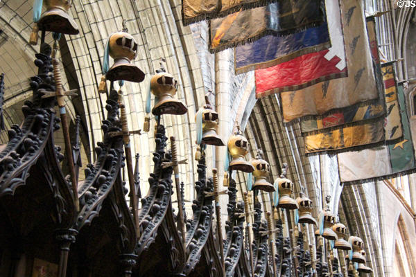 Knights' helmets atop choir stalls at St Patrick's Cathedral. Dublin, Ireland.