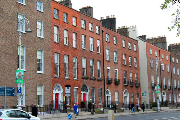 Multiple chimney pots on Georgian row houses lining Merrion Square. Dublin, Ireland.