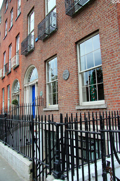Facade & iron railings of former house of Liberator Daniel O'Connell on Merrion Square. Dublin, Ireland.