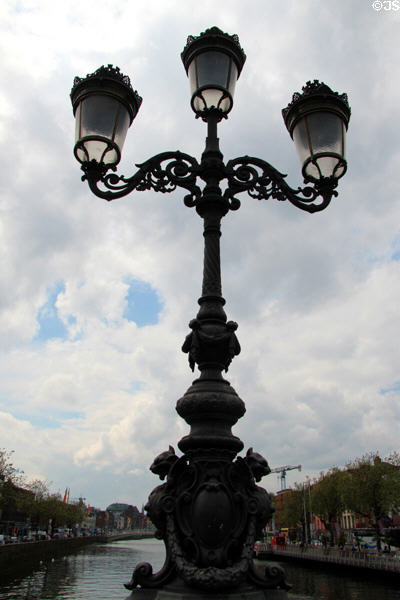 Cast iron lampstand on O'Connell Street bridge (aka Carlisle Bridge) (1880). Dublin, Ireland.