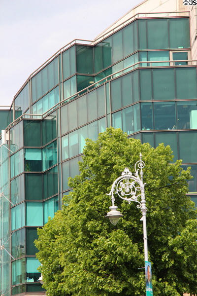 Street lampstand & International Financial Services Centre (IFSC) (Custom House Quay). Dublin, Ireland.