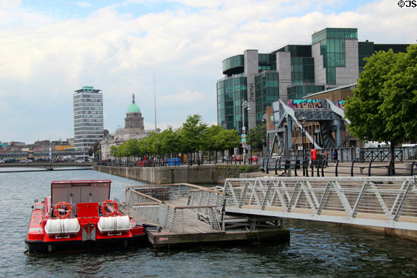 River Liffey with Liberty Hall, Custom House, IFSC House & Scherzer Rolling Lift Bridges. Dublin, Ireland.
