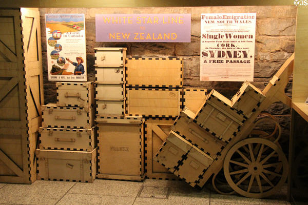 Destination posters & symbolic luggage at Irish Emigration Museum (EPIC). Dublin, Ireland.
