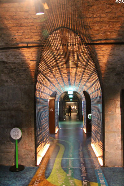 Vaults of customs warehouse lighted to transform them to museum display of Irish Emigration Museum (EPIC). Dublin, Ireland.
