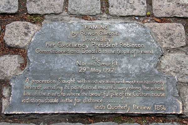 Dedication plaque at Famine Monument near Irish Emigration Museum (EPIC). Dublin, Ireland.