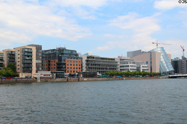 Modern architecture of International Financial Services Centre development area including Dublin Convention Center on River Liffey. Dublin, Ireland.