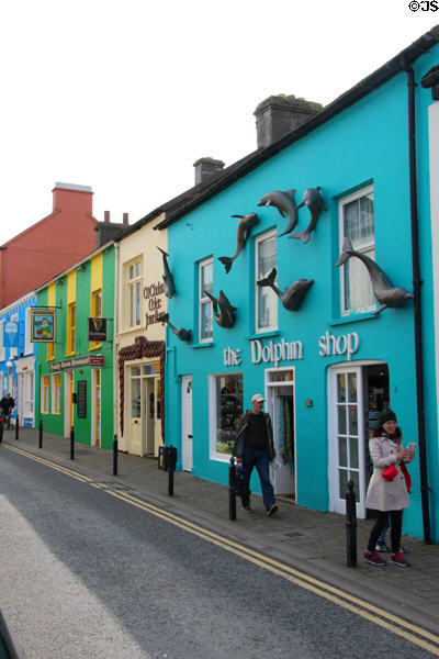 The Dolphin Shop with facade decorated with sculptures of dolphins in Dingle. Dingle, Ireland.