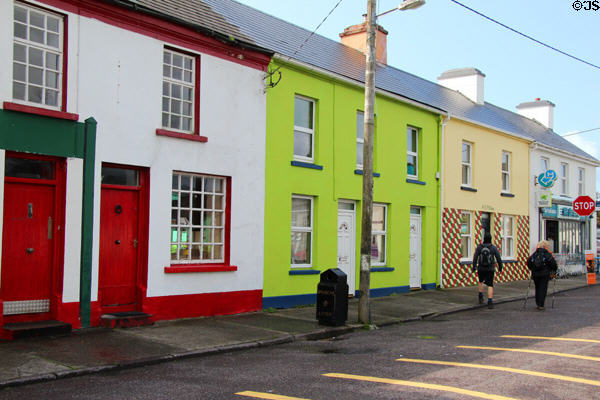 Streetscape of colorful houses facing South Square of Sneem. Sneem, Ireland.