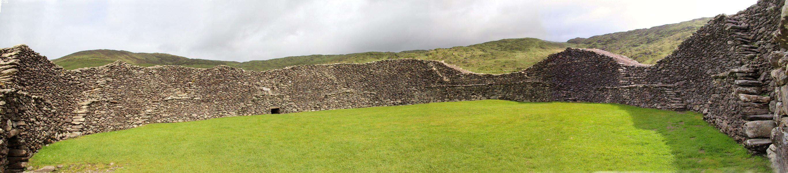 Panorama of circular interior of Staigue Fort on Ring of Kerry. Ireland.