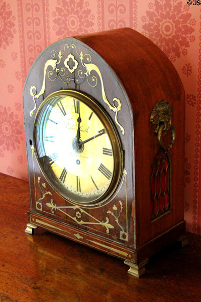 Table clock by Edie Smith of Jervis Street, Dublin, in drawing room at Derrynane House. Ireland.