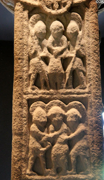 Soldiers casting lots for Christ's garment & flagellation of Christ carvings on cross of Scriptures (east face) at Clonmacnoise museum. Ireland.