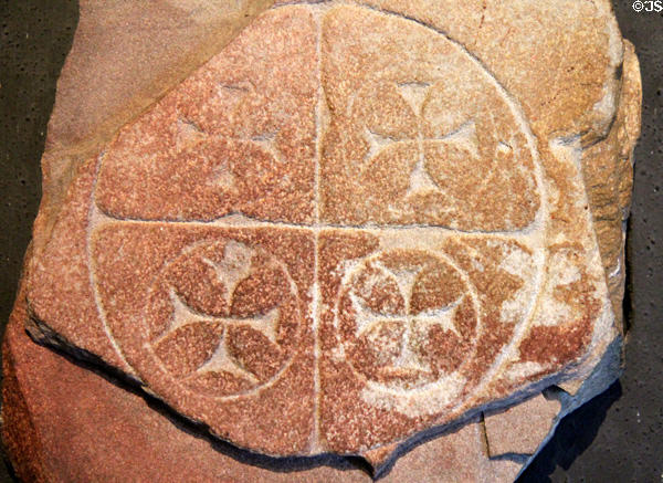 Grave slab with four crosses in circles at Clonmacnoise museum. Ireland.