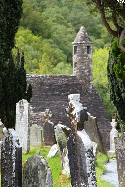 St Kevin's Church over tombstones at Glendalough. Ireland.