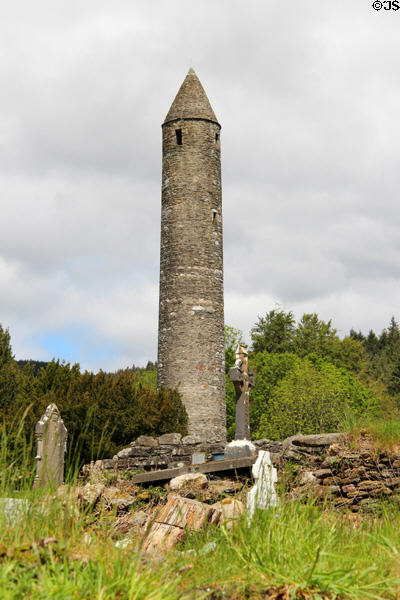 Round tower (c11thC) (30m tall with 6 floors) at Glendalough. Ireland.