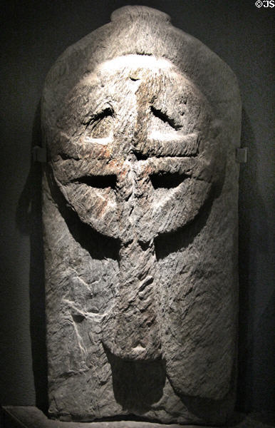 Medieval Christian tombstone at Glendalough Visitor Centre. Ireland.