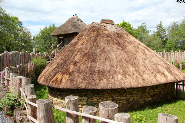 Replica of Ringfort (700 CE) with thatched roofs at Irish National Heritage Park. Ireland.