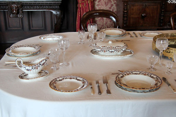 Table place settings in state dining room at Kilkenny Castle. Ireland.