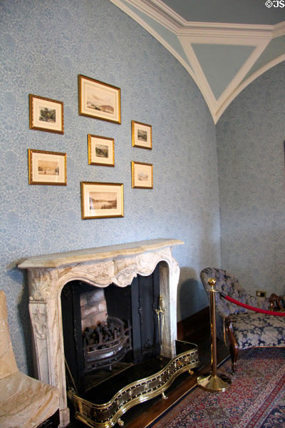 Fireplace in blue bedroom at Kilkenny Castle. Ireland.