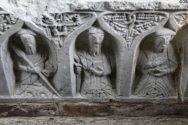 Carved saints under Celtic designs at Jerpoint Abbey. Ireland.