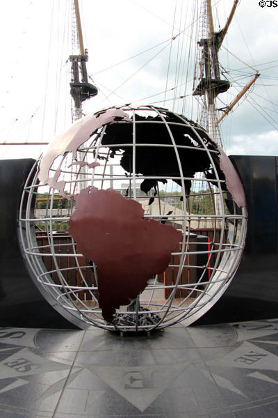 World globe with eternal flame at Dunbrody Famine Ship. New Ross, Ireland.