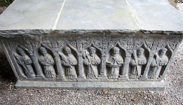 Carved stone tomb (16thC) with saints in cathedral at Rock of Cashel. Cashel, Ireland.