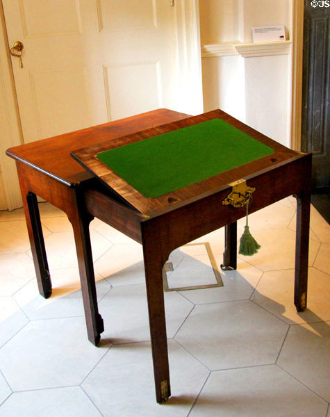 Writing desk which slides out from small table at Bishop's Palace. Waterford, Ireland.