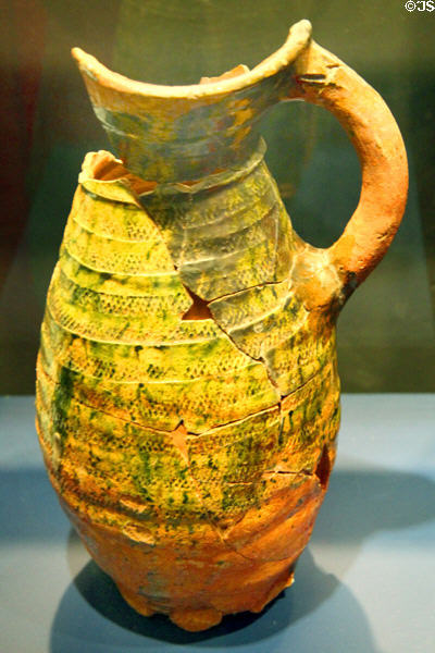 Flemish ceramic wine jug (c1250) with 'raspberry' pattern from Bruges at Museum of Treasures. Waterford, Ireland.