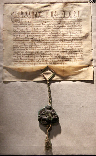 Royal charter (1315) given by King Edward II confirming earlier lands charter given by King John to Benedictine Priory at Museum of Treasures. Waterford, Ireland.