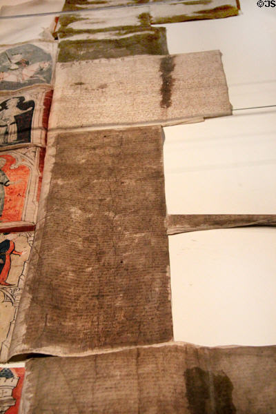 Addendum to parchment document was literally a strip of skin stitched to the side of amended charter at Museum of Treasures. Waterford, Ireland.
