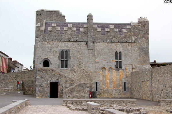 Ancient Desmond Castle, also known as Desmond Hall, set in middle of town's market square. Newcastle West, Ireland.