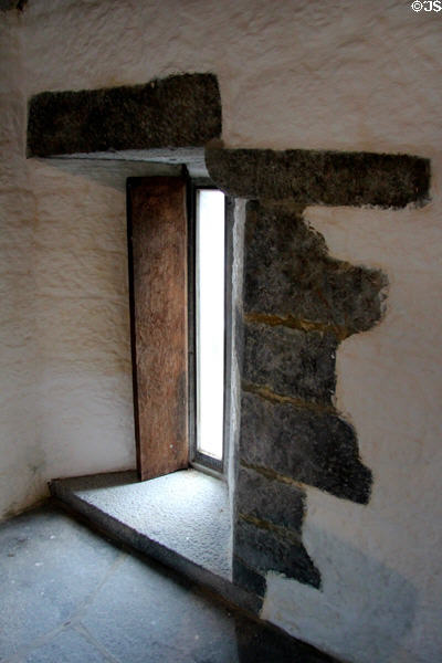 Deeply recessed window with quoins at Desmond Castle. Newcastle West, Ireland.