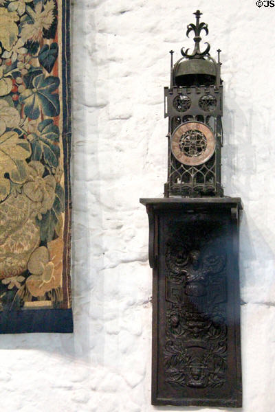 Ancient mantle clock in Great Hall at Bunratty Castle. County Clare, Ireland.