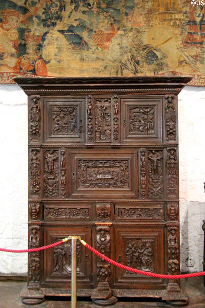 Oak dower cupboard in Great Hall at Bunratty Castle. County Clare, Ireland.