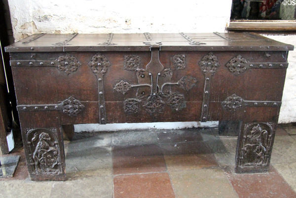 Ornate wooden chest with iron strapping in Great Hall at Bunratty Castle. County Clare, Ireland.