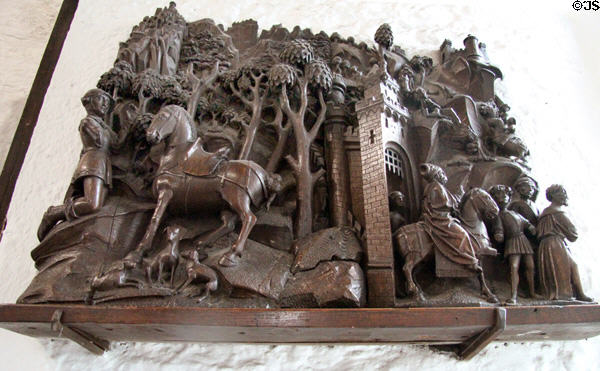 Medieval relief scene created in wood at Bunratty Castle. County Clare, Ireland.