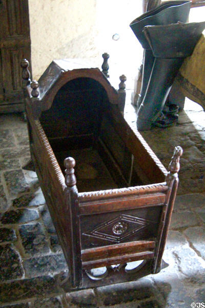 Cradle in Earl's bedroom at Bunratty Castle. County Clare, Ireland.