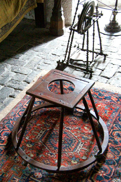 Vintage toddler's walker in Earl's bedroom at Bunratty Castle. County Clare, Ireland.