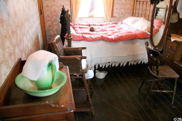 Bedroom in Golden Vale Farmhouse at Bunratty Castle & Folk Park. County Clare, Ireland.