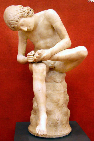 Roman-era sculpture of Boy with Thorn (Spinario) (1st C BCE) at Uffizi Gallery. Florence, Italy.