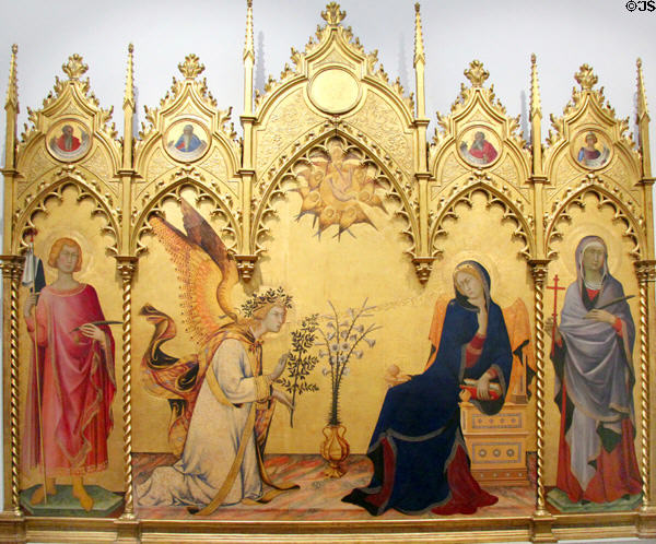 Annunciation with St. Ansanus & St. Maxima painting (1333) by Simone Martini & Lippo Memmi at Uffizi Gallery. Florence, Italy.