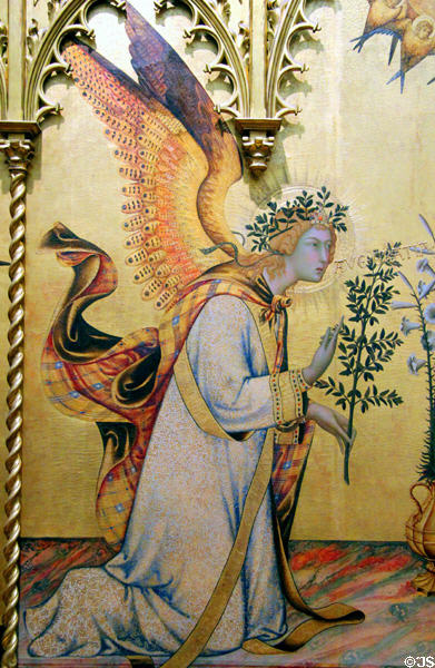 Archangel Gabriel detail of Annunciation painting (1333) by Simone Martini & Lippo Memmi at Uffizi Gallery. Florence, Italy.