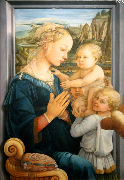 Madonna & Child with two angels painting (c1460-5) by Filippo Lippi at Uffizi Gallery. Florence, Italy.