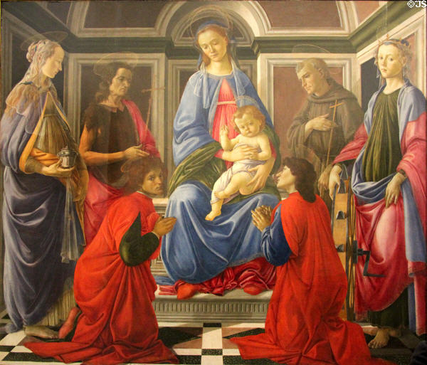 Madonna & Child with St Mary Magdalene, St John the Baptist, St Catherine of Alexandria, & Sts Cosmas & Damian painting (c1467-9) by Sandro Botticelli at Uffizi Gallery. Florence, Italy.